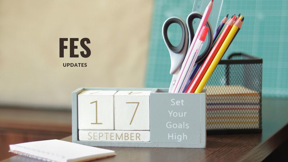 Image of a desk calendar with the date September 17th shown and office supplies with text of fes updates
