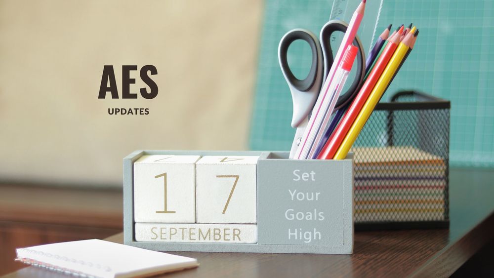image of a desk calendar with the date Spetember 17th shown and desk supplies with text of AES  updates