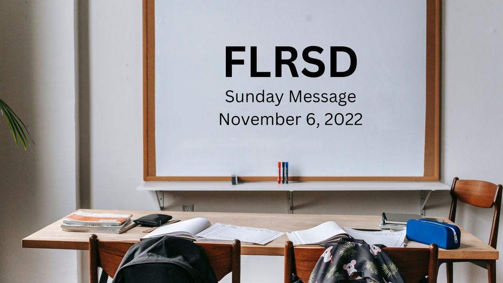image of a classroom with text on the whiteboard of FLRSD Sunday message, November 6, 2022