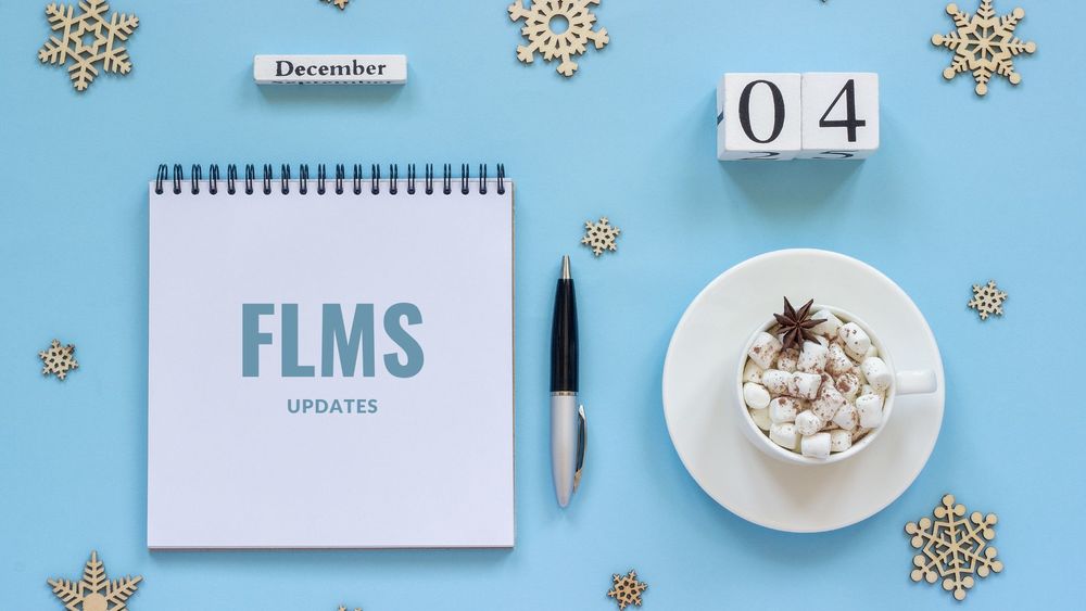 image of notepaper, pen, and hot cocoa with text of FLMS updates, December 4, 2022