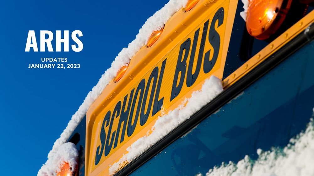 image of a school bus with a dusting of snow and text of ARHS updates, January 22, 2023