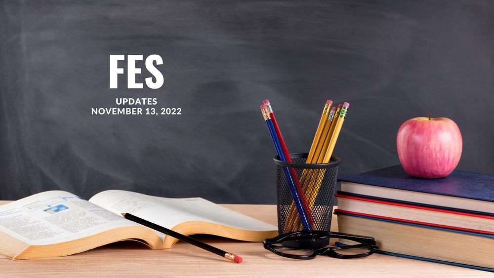 image of a blackboard with school supplies in front and text of FES updates, November 13, 2022