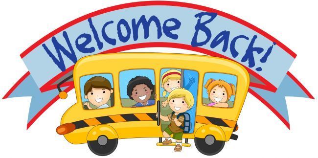 students on a school bus with a welcome back sign