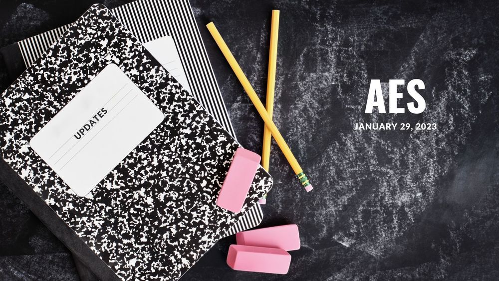 image of composition notebooks with pencils and erasers and text of AES updates, januaru 29, 2023