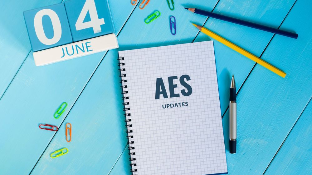 image of desk supplies with text of AES updates, June 4