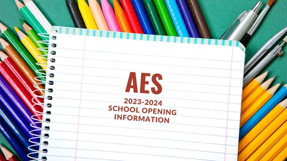 image of a notebook surrounded by colorful pens and pencils with text of AES 2023-2024 School Opening Information